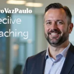 Smiling professional man in a business suit representing PedroVazPaulo Executive Coaching, highlighting leadership development and personal growth strategies.