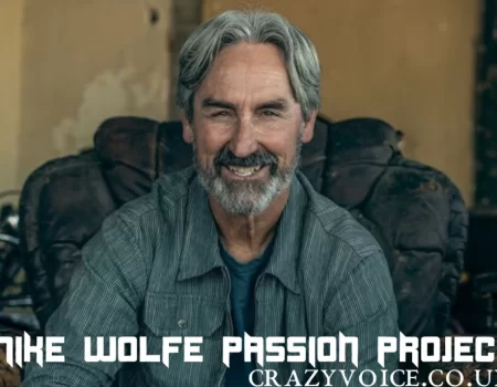 Mike Wolfe standing proudly beside his mike wolfe passion project, showcasing his creativity, restoration skills, and dedication to preserving history.